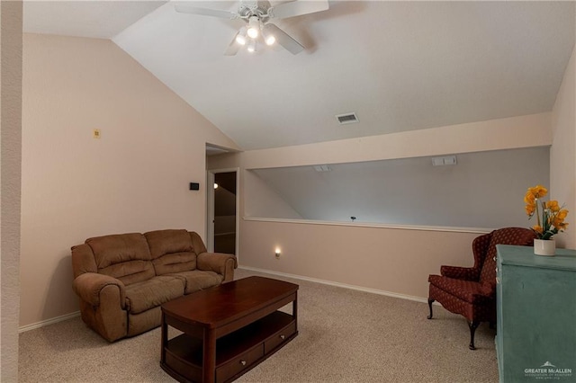 living room featuring ceiling fan, light colored carpet, and lofted ceiling