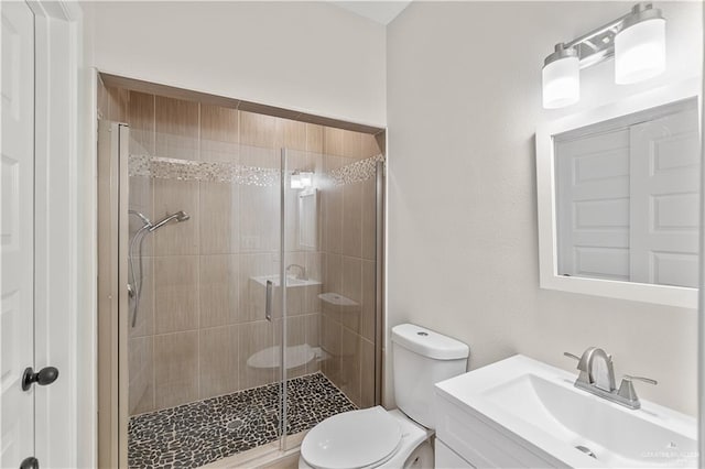 4630 Kristine Dr, Harlingen, TX 78552 - full bath with a shower stall, vanity, and toilet