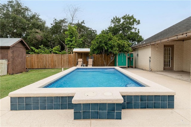 605 W Lozano St, Harlingen, TX 78550 - view of swimming pool featuring a shed, a patio, and a fenced backyard