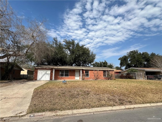 single story home featuring a garage and a front yard