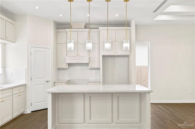 4312 Xenops Ave, Mcallen, TX 78503 - kitchen featuring dark wood-style floors, a center island, tasteful backsplash, recessed lighting, and pendant lighting