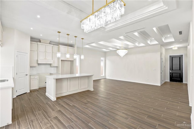 4312 Xenops Ave, Mcallen, TX 78503 - kitchen featuring a chandelier, open floor plan, dark wood finished floors, recessed lighting, and a center island