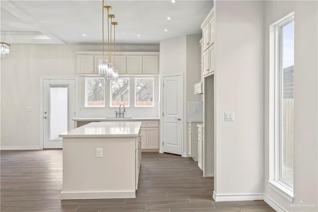4312 Xenops Ave, Mcallen, TX 78503 - kitchen featuring a sink, dark wood-type flooring, a chandelier, light countertops, and recessed lighting