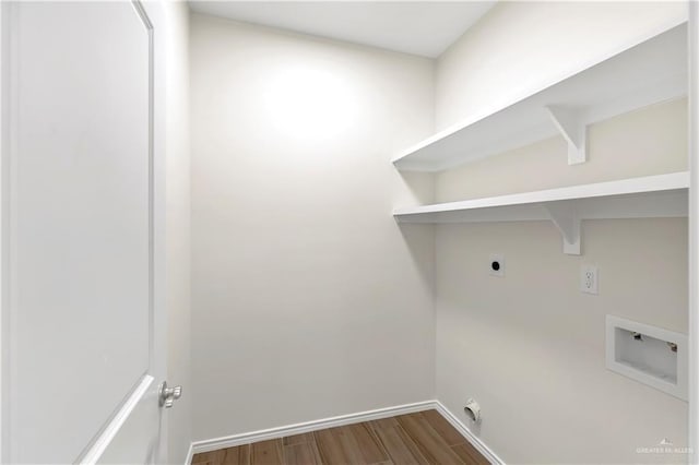 4312 Xenops Ave, Mcallen, TX 78503 - laundry room with hookup for an electric dryer, washer hookup, wood finished floors, and baseboards