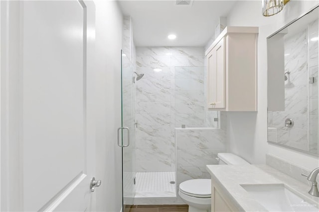 4312 Xenops Ave, Mcallen, TX 78503 - full bath with toilet, a marble finish shower, recessed lighting, and vanity