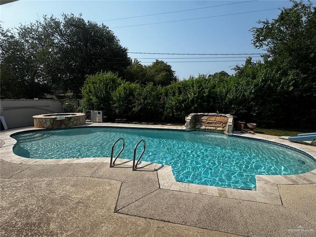 1108 Ash Dr, Weslaco, TX 78596 - view of pool featuring an in-ground hot tub, a patio area, and a diving board