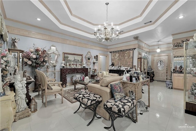 living room with a notable chandelier, ornamental molding, a raised ceiling, and light tile patterned flooring