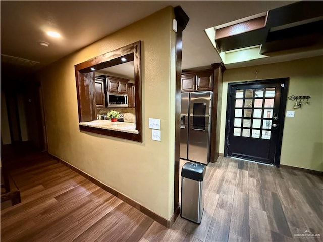 812 W Falcon Ave, Pharr, TX 78577 - hallway featuring wood finished floors and baseboards