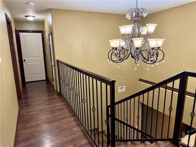 812 W Falcon Ave, Pharr, TX 78577 - hallway featuring a chandelier and wood finished floors