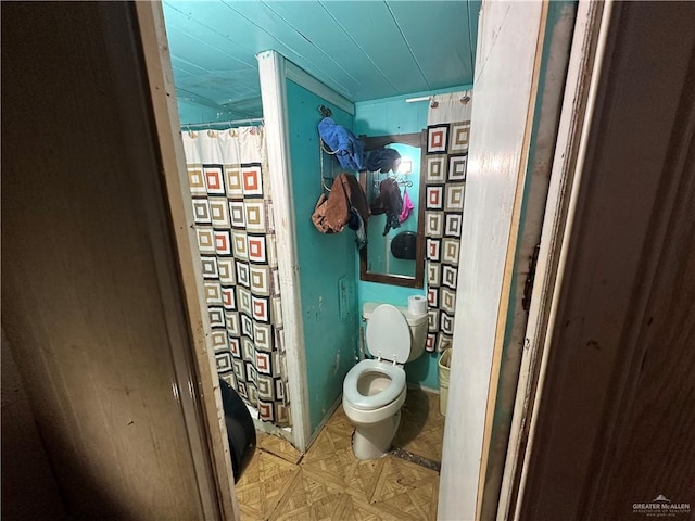 bathroom featuring toilet