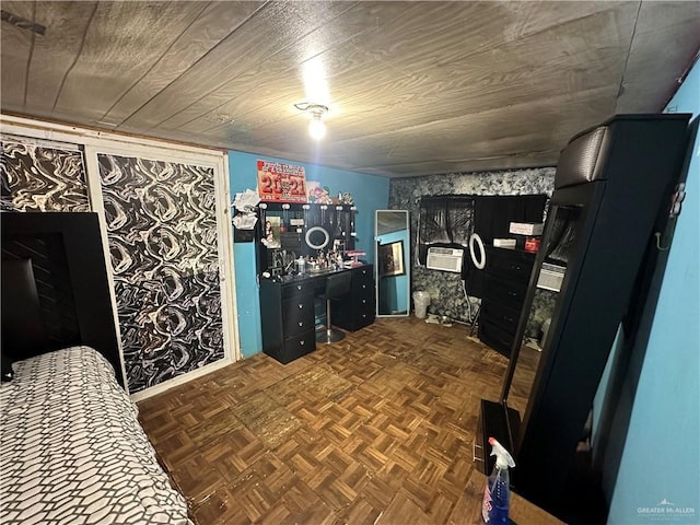 bedroom with dark parquet floors