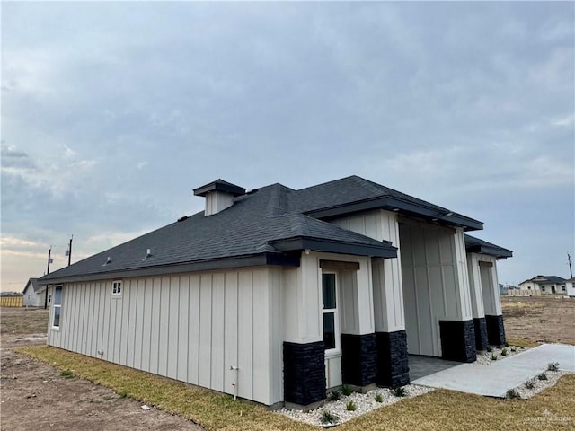 view of property exterior featuring a yard