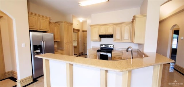 kitchen featuring sink, kitchen peninsula, stainless steel appliances, and light brown cabinetry