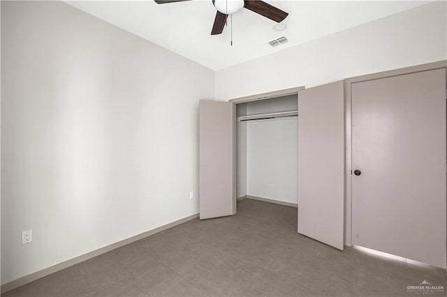 unfurnished bedroom featuring ceiling fan