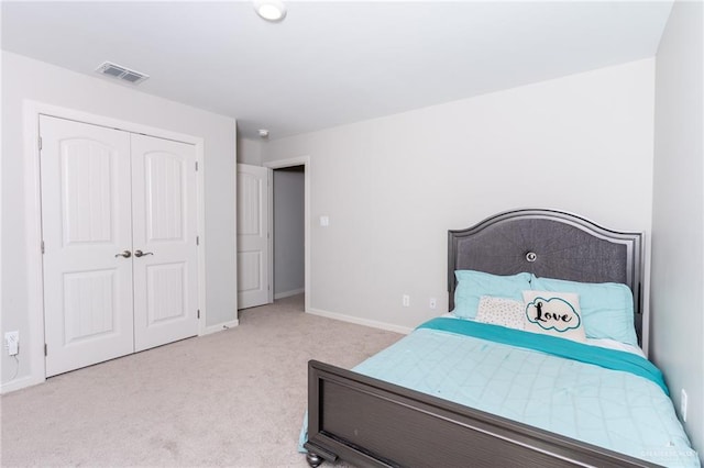 6101 White River Dr, Mcallen, TX 78504 - bedroom featuring baseboards, light carpet, a closet, and visible vents