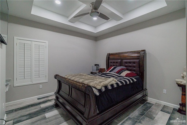 bedroom featuring wood finished floors, baseboards, a ceiling fan, and recessed lighting