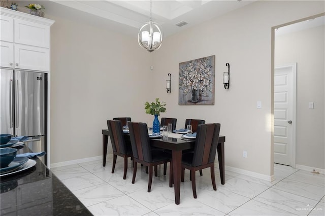 dining area with visible vents, marble finish floor, baseboards, and a notable chandelier