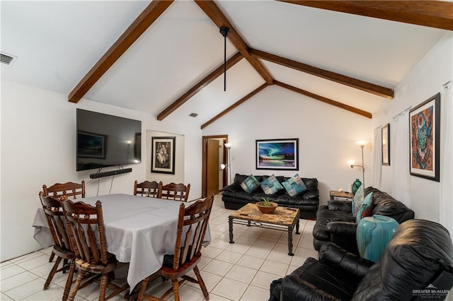 dining area featuring visible vents, vaulted ceiling with beams, and light tile patterned floors