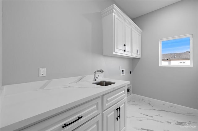 clothes washing area with hookup for a washing machine, cabinet space, hookup for an electric dryer, marble finish floor, and a sink
