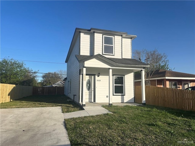 3018 Greenwood Dr, Corpus Christi, TX 78405 - view of front of house with a front lawn, a porch, and fence private yard