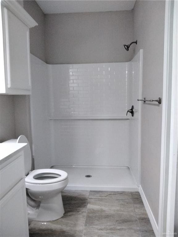 3018 Greenwood Dr, Corpus Christi, TX 78405 - full bath featuring toilet, vanity, and a shower stall