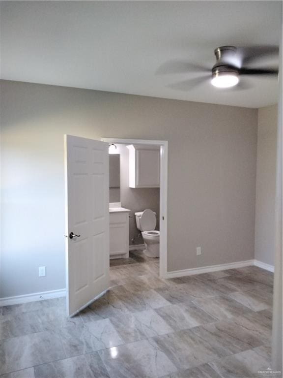 3018 Greenwood Dr, Corpus Christi, TX 78405 - unfurnished room with baseboards and ceiling fan