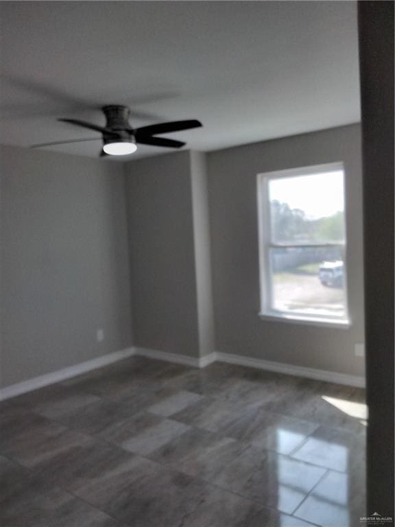 3018 Greenwood Dr, Corpus Christi, TX 78405 - spare room with baseboards and ceiling fan