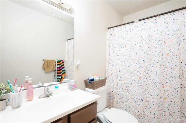 3292 Turquia St, Brownsville, TX 78520 - full bath with vanity and toilet