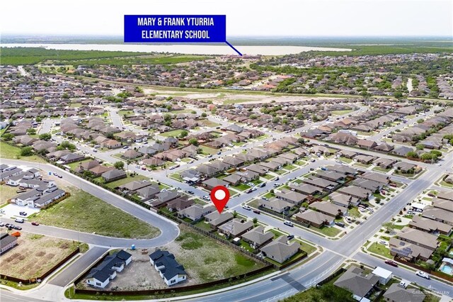 3292 Turquia St, Brownsville, TX 78520 - bird's eye view featuring a water view and a residential view
