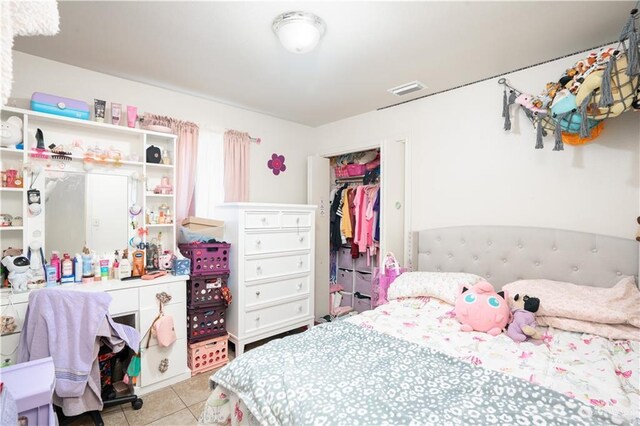 3292 Turquia St, Brownsville, TX 78520 - bedroom with a closet, light tile patterned floors, and visible vents