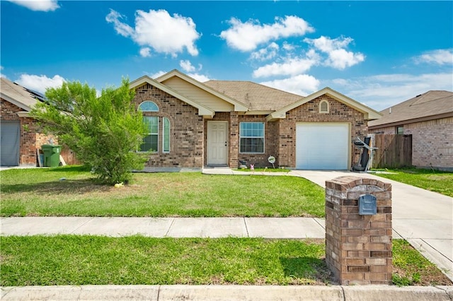 3292 Turquia St, Brownsville, TX 78520 - single story home with a garage, concrete driveway, brick siding, and a front yard