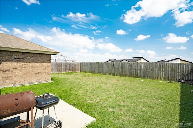 3292 Turquia St, Brownsville, TX 78520 - view of yard with a fenced backyard and a patio area