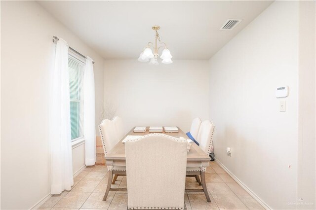 3292 Turquia St, Brownsville, TX 78520 - dining space featuring visible vents, baseboards, light tile patterned floors, and a notable chandelier