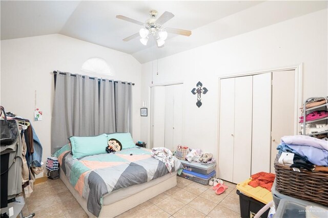 3292 Turquia St, Brownsville, TX 78520 - bedroom with light tile patterned floors, a ceiling fan, two closets, and lofted ceiling
