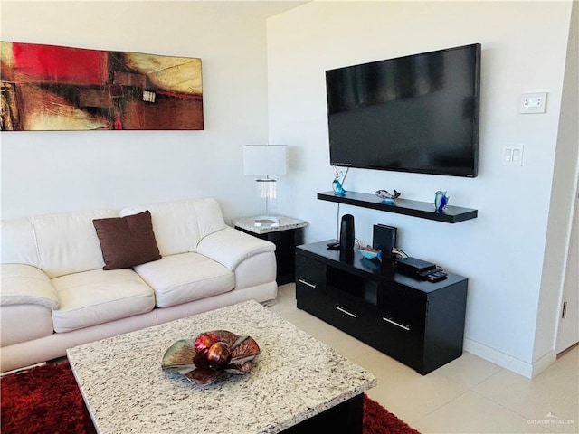 2100 Gulf Blvd, South Padre Island, TX 78597 - living area with baseboards and light tile patterned flooring