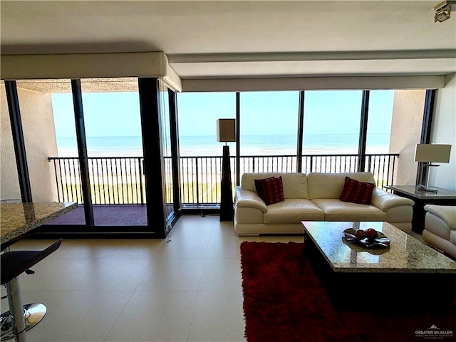 2100 Gulf Blvd, South Padre Island, TX 78597 - living room with view of water and beach and floor to ceiling windows