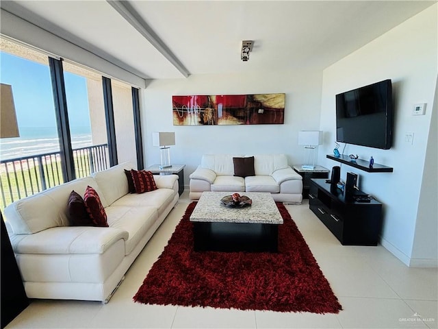 2100 Gulf Blvd, South Padre Island, TX 78597 - living area with baseboards and light tile patterned flooring