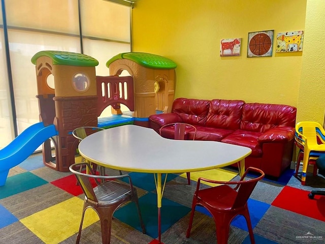 2100 Gulf Blvd, South Padre Island, TX 78597 - recreation room featuring a textured wall