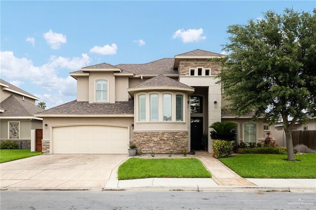 2509 Mcleod Ave, Edinburg, TX 78539 - view of front of property featuring stucco siding, stone siding, concrete driveway, a garage, and roof with shingles