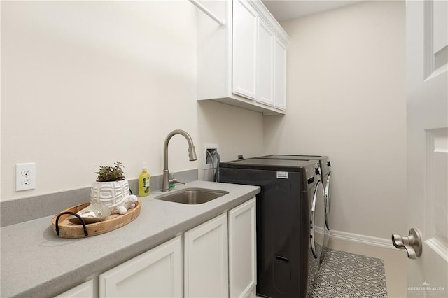 2509 Mcleod Ave, Edinburg, TX 78539 - laundry room with independent washer and dryer and cabinet space