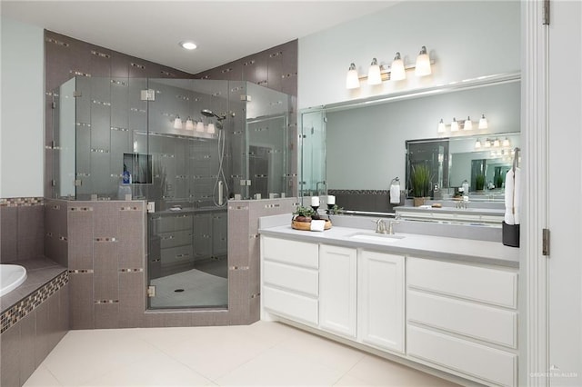 2509 Mcleod Ave, Edinburg, TX 78539 - bathroom with vanity, tile patterned flooring, a shower stall, and a bath