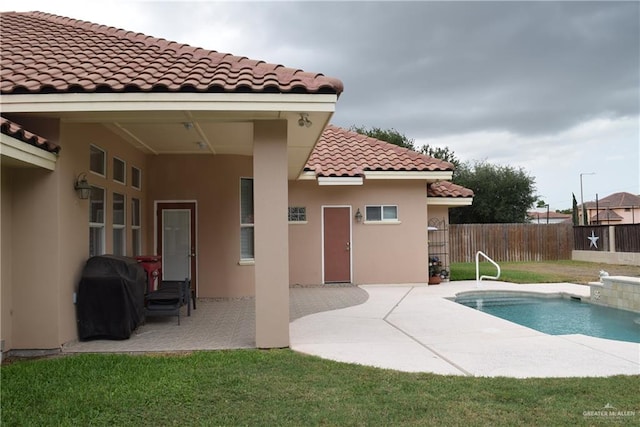 2707 Live Oak St, Mission, TX 78574 - view of swimming pool featuring area for grilling and a patio
