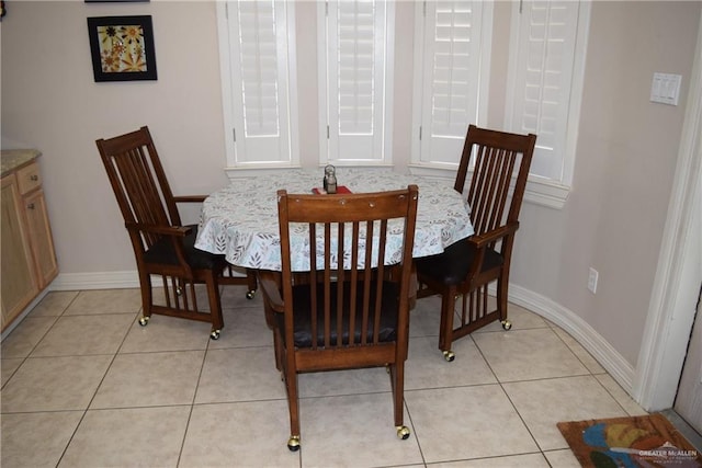 2707 Live Oak St, Mission, TX 78574 - dining space featuring baseboards and light tile patterned floors