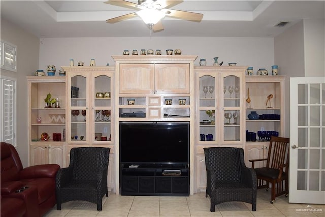 2707 Live Oak St, Mission, TX 78574 - sitting room with ceiling fan, light tile patterned floors, and a tray ceiling