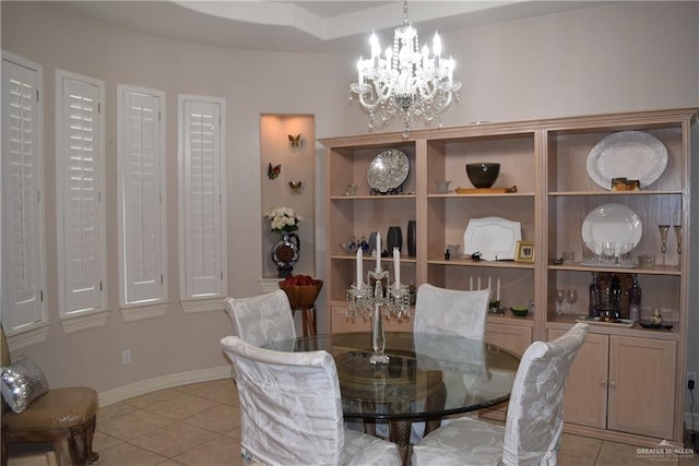 2707 Live Oak St, Mission, TX 78574 - dining area featuring light tile patterned floors and a chandelier