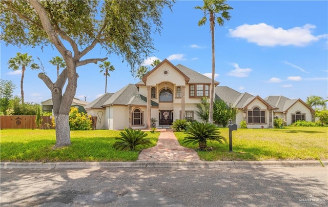 view of front of property with a front lawn