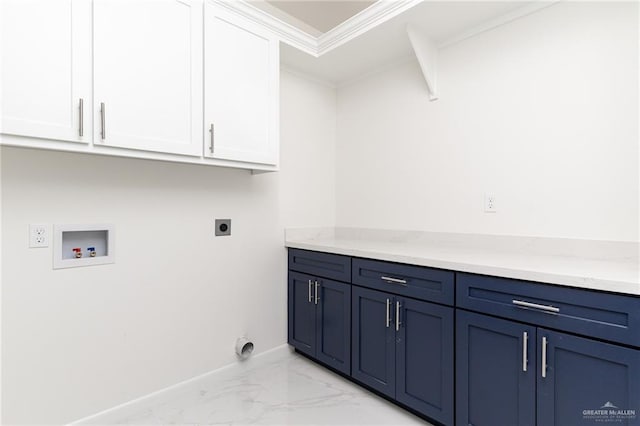 clothes washing area with electric dryer hookup, crown molding, hookup for a washing machine, and cabinets