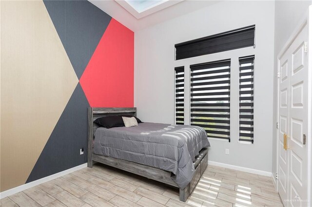 bedroom featuring wood-type flooring