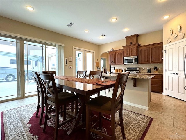 dining space with sink