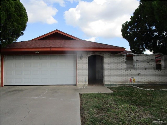 ranch-style home with a garage